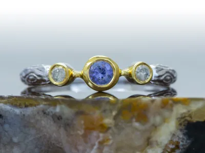 Ring mit Tansanit und Diamanten