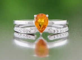 Silberring mit orangefarbenem Saphir